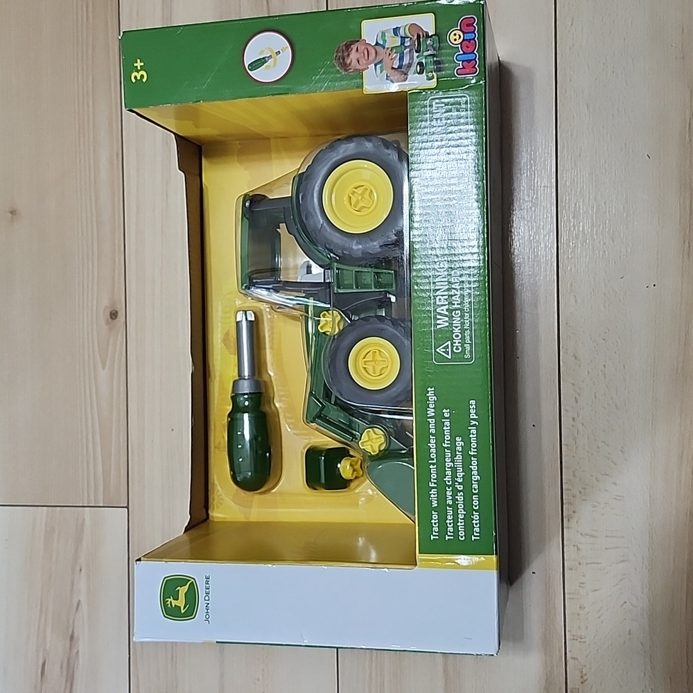 John deere tractor with front loader and weight
